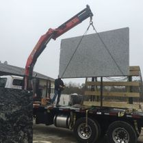 Granite Being Loaded Into Truck