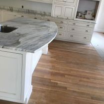 Beautiful Marble Counter and White Cabinets